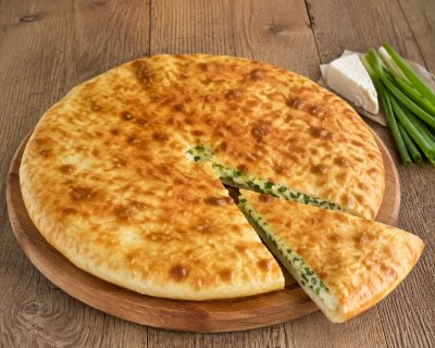 Осетинский пирог с сыром и зеленым луком